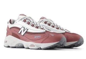 New Balance 1000 "Monarch Burgundy" shoe showcasing deep burgundy mesh, black accents, and modern reflective detailing